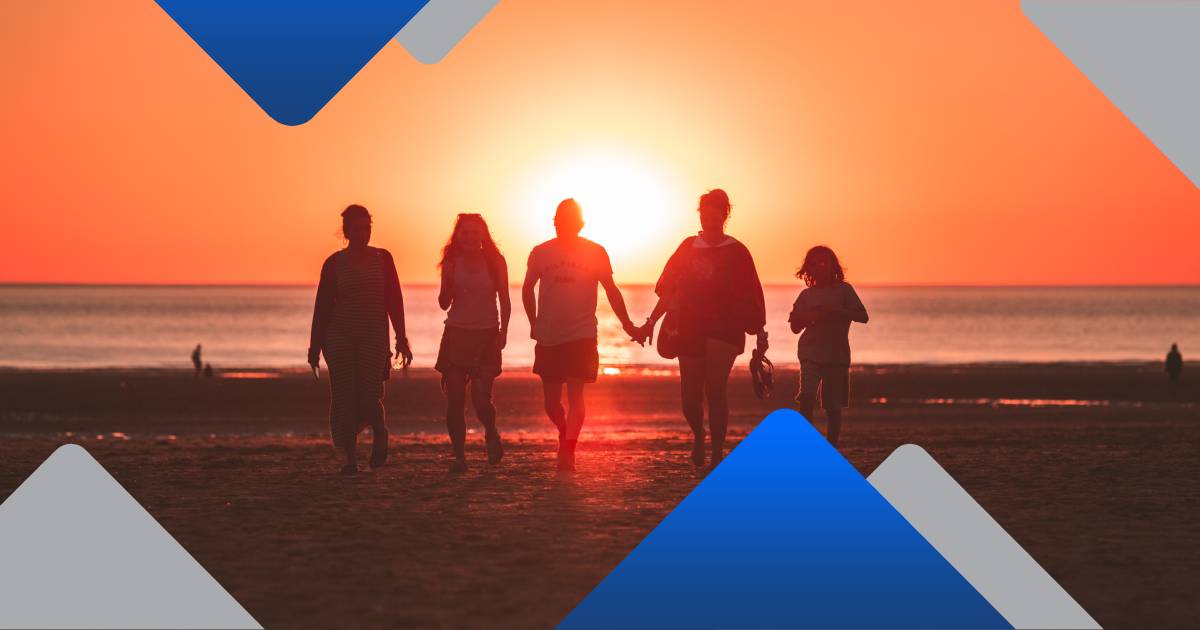 Family walking on the beach